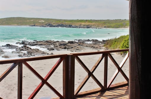 a view of the beach from the porch