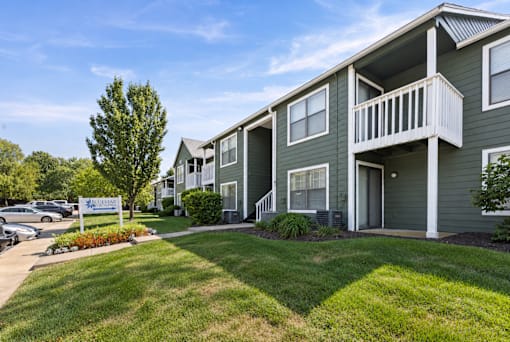 A sunny day at a well-kept apartment complex.