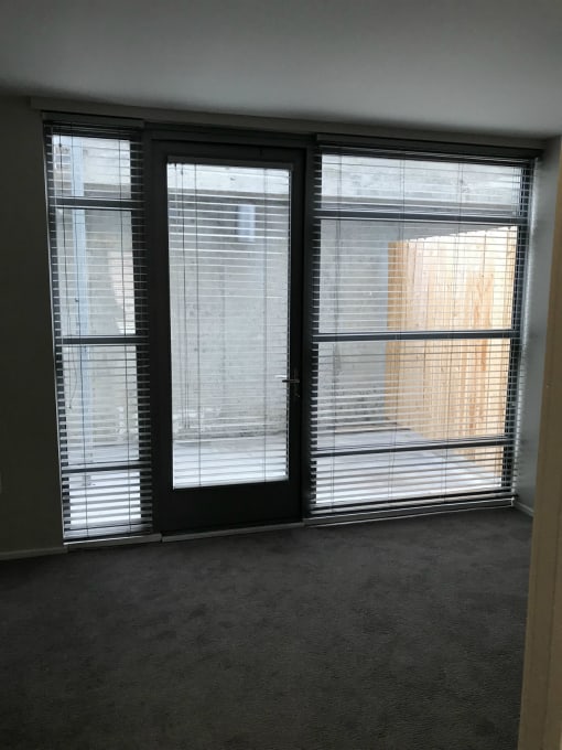 Allure floorplan sencond bedroom looking out toward patio