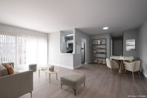 model living room and dining room with grey wood floors