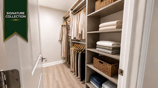 A neatly organized closet with a sign that says "Signature Collection".