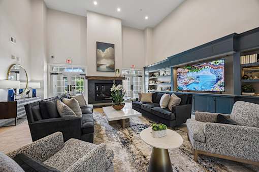 Resident clubhouse lounge with fireplace - Avenel at Montgomery Square