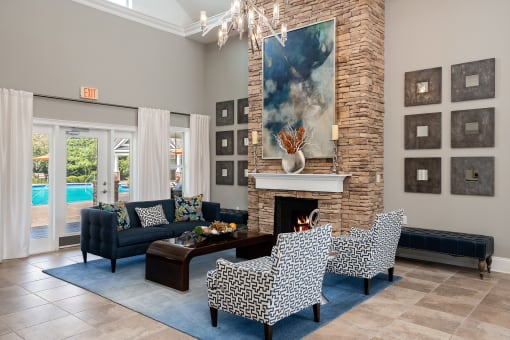 Carrington Place at Shoal Creek - Resident clubhouse social area with fireplace