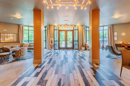 Centre Pointe Apartments clubhouse entrance with high ceilings and lounge areas