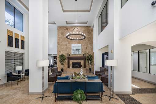 Resident clubhouse great room with fireplace - Monterra Las Colinas Apartments