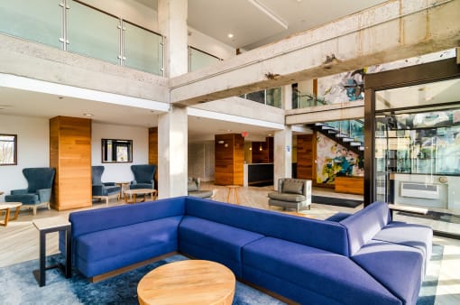 Resident clubhouse with ample seating - Eitel Apartments