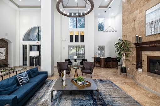 Resident clubhouse with ample seating - Monterra Las Colinas Apartments