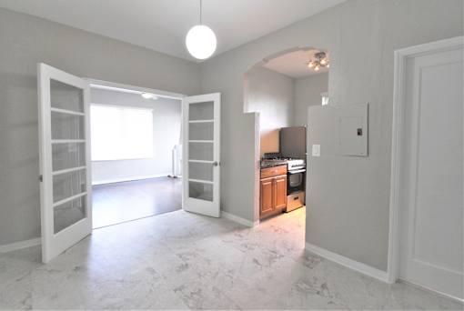 Black appliances in kitchens in select units - Helios Apartments Miami Beach