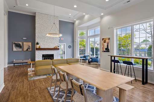 Social area in resident clubhouse with fireplace - The Gardens at Polaris