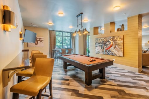 Centre Pointe Apartments game area with a billiards table