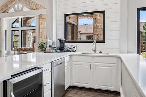 Clubhouse social area with coffee bar - Grand Centennial Apartments