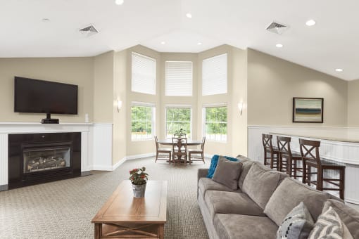 Clubhouse social area with tv - Hampshire Green Apartments