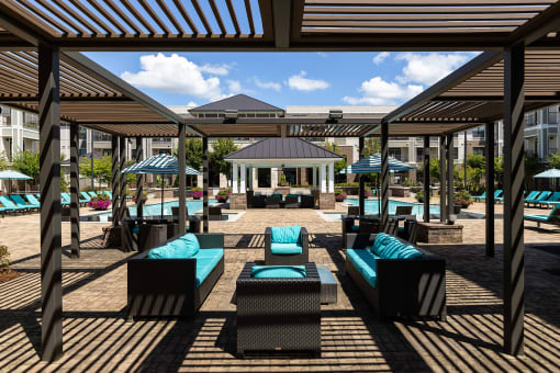 The Juncture Apartments outdoor cabana and fire pit lounge
