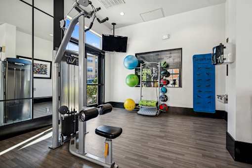 24-hour fitness center - Acadia at Cornerstar Apartments