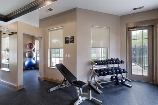 Lantern Woods Apartments - Fully-equipped fitness center with free weights