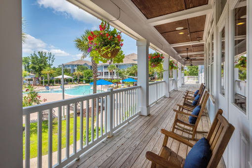 Windward Long Point Apartments - Deck overlooking saltwater pool