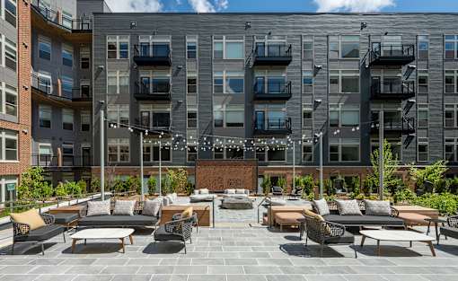 Outdoor seating area with fire pit - Brentford at the Mile