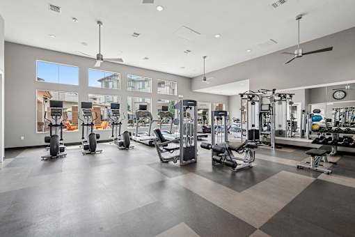 24-hour fitness center - First and Main Apartments