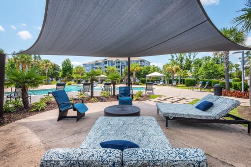 Windward Long Point Apartments - Poolside covered lounge area