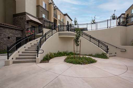 Dramatic courtyard staircase - Talavera Apartments