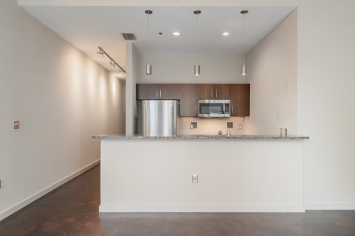 Pendant lighting over breakfast bar* - Main 3 Downtown