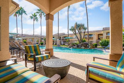 Poolside cabana with ample seating - Arrowhead Landing Apartments