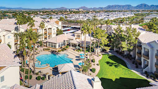Aerial picture of property including resort-style swimming pool and buildings - Sonterra Apartments at Paradise Valley