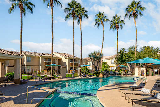 Resort-style swimming pool with heated spa - Arrowhead Landing Apartments