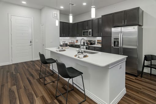 Modern kitchens with stainless steel appliances - Debbie Lane Flats