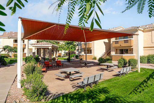 BBQ lounge area - Arrowhead Landing Apartments
