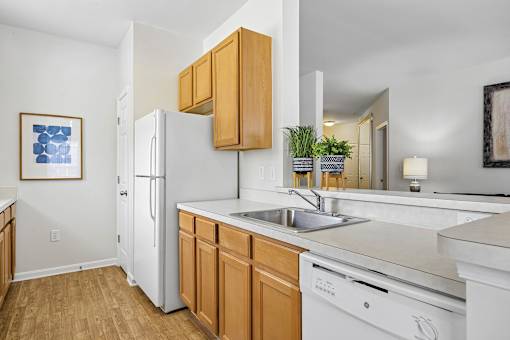Classic-style kitchen package with white appliances - Avenel at Montgomery Square