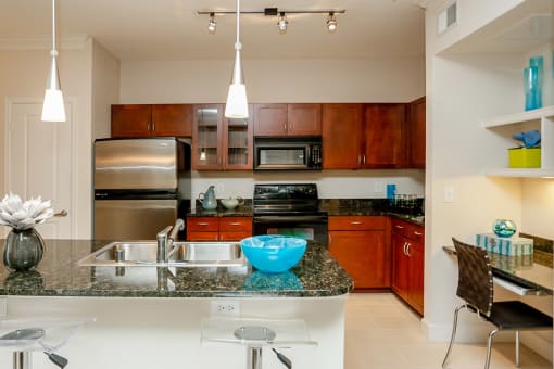 3000 Sage - Gourmet kitchen with modern fixtures and nearby built-in desk