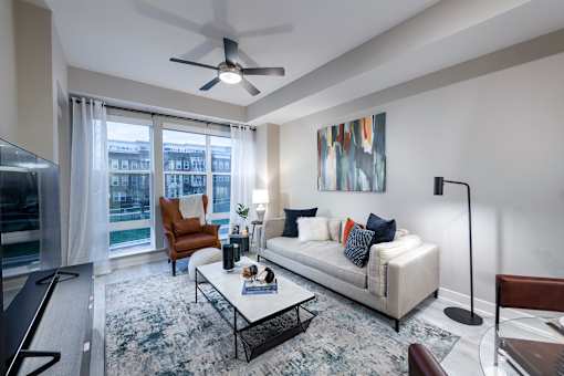 Sleek ash-grey flooring in living areas - Rockwell at Crown