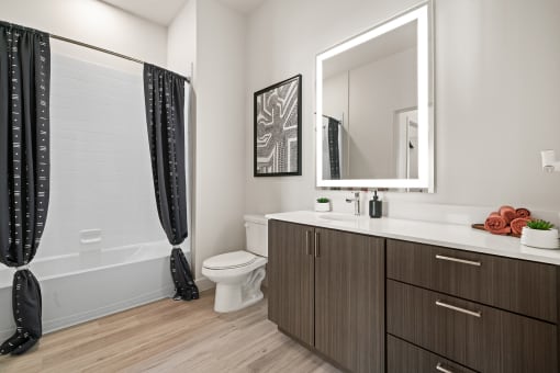 Lighted vanity mirrors in select bathrooms - La Via Apartments