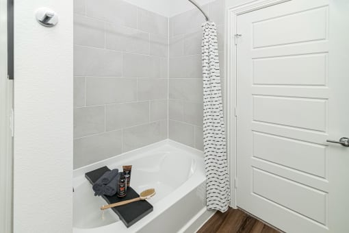Oval tub and shower - Debbie Lane Flats