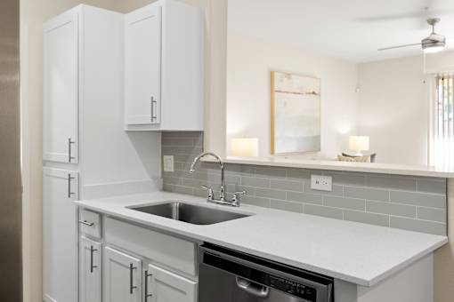 Contemporary gooseneck faucet - Arrowhead Landing