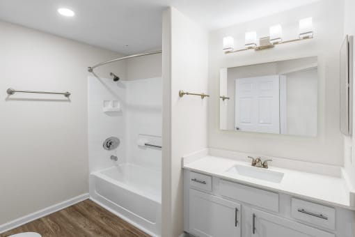 Quartz countertops in bathrooms - Arrowhead Landing Apartments