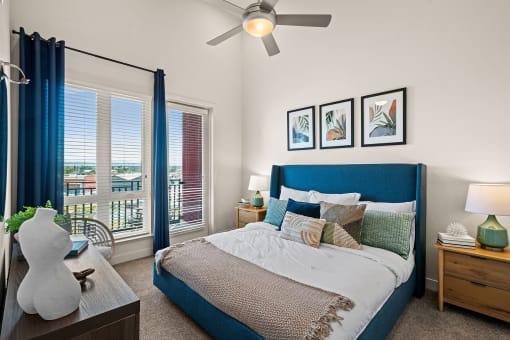 Carpeted bedrooms with lighted ceiling fans - La Via Apartments