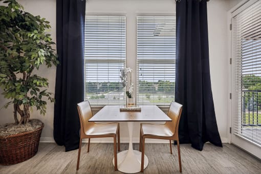 Dining room with lots of natural light - Enclave at Cherry Creek