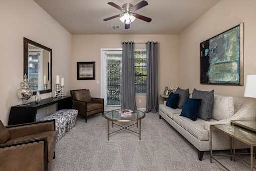 Lighted ceiling fans in living rooms - Monterra Las Colinas Apartments