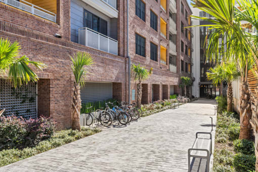 Element 29 Apartments - Bike storage by paved walkway