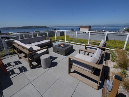 Outdoor Patio With Firepit at Ellie Passivhaus, Seattle, WA