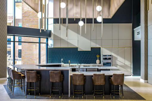 barstools around a counter in an indoor kitchen at The Apex at CityPlace, Overland Park, KS, 66210
