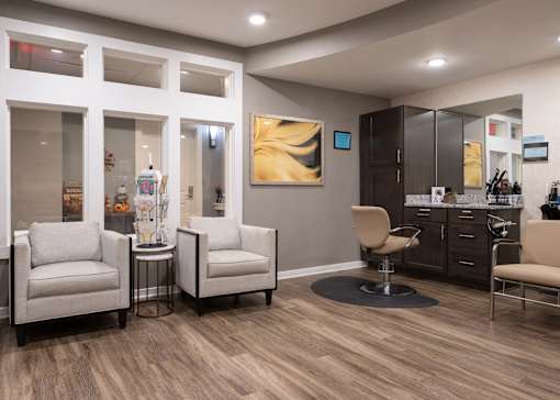 A salon with chairs at Aspen Ridge 55+ Active Adult Community
