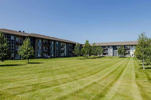 A Large Grassy Field at Capitol Grove Apartments, Iowa