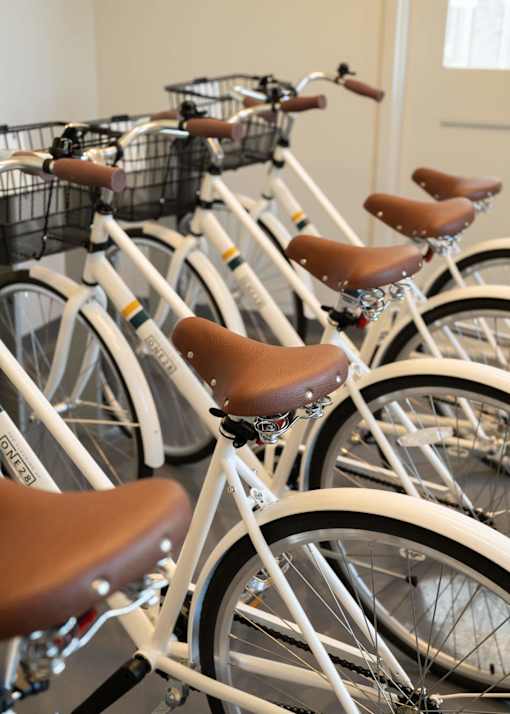 a row of bikes parked next to each other at The Clearing at ONE28, Olathe, KS, 66062