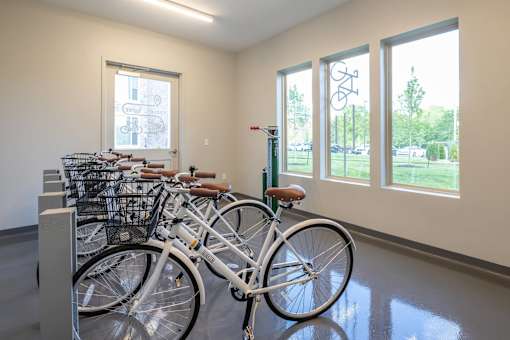 a row of bikes parked in a room at The Clearing at ONE28, Kansas
