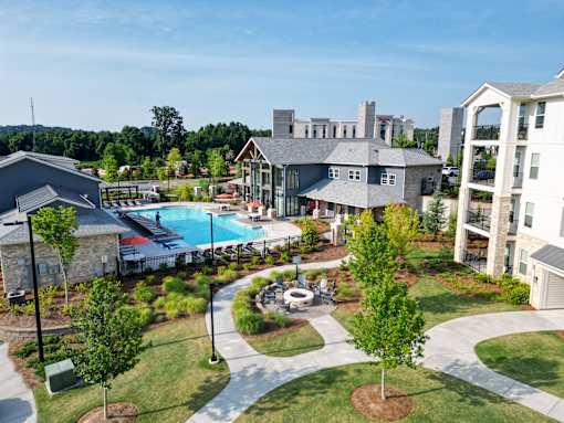 Aerial view of resortstyle pool and courtyard amenities at The Crest at Acworth Apartments, Georgia