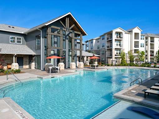 Resort style swimming pool with covered pavilion at The Crest at Acworth Apartments, Acworth, GA 30102
