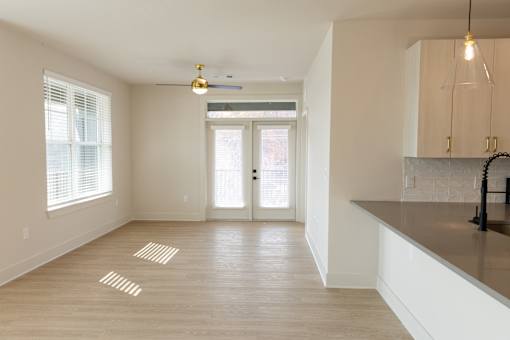 Open airy room with natural lighting at District on the Etowah Apartments, Georgia, 30114